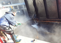 Inside tank cleaning operation, using a high-pressure washing machine