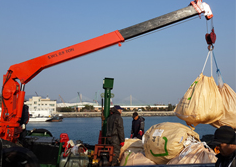 Transfer of the collected solid waste (designated waste) to the YU SEUNG
